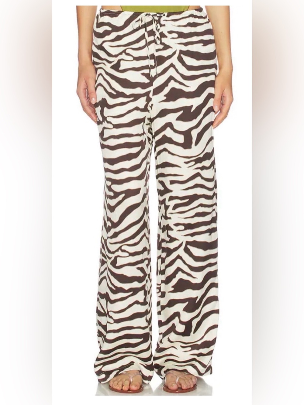 Mango Flowy wide-leg pants with zebra print.